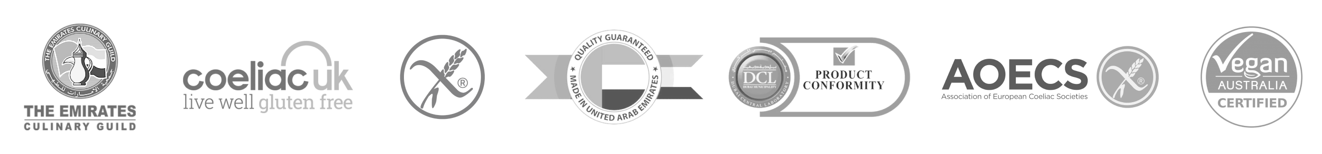 Skinny Genie gluten-free food manufacturing facility — Made in the Emirates, Coeliac UK certified (CUK-G-145) since 2013, AOECS Standard 3.0 (SGS audited), ISO 22000:2018, HACCP, Halal, Vegan Australia, Dubai Municipality A Gold Grade. Every batch verified at under 5 parts per million (PPM) in our in-house ELISA testing laboratory. Trusted by airlines, hotels, contract caterers, supermarkets, and private-label brands across the UAE, Saudi Arabia, Oman, Qatar, Kuwait